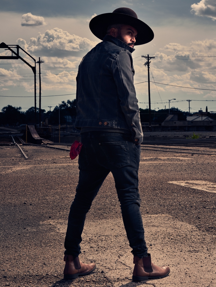 New Mexico folk musician Garry Blackchild photographed at the Albuquerque Rail yards